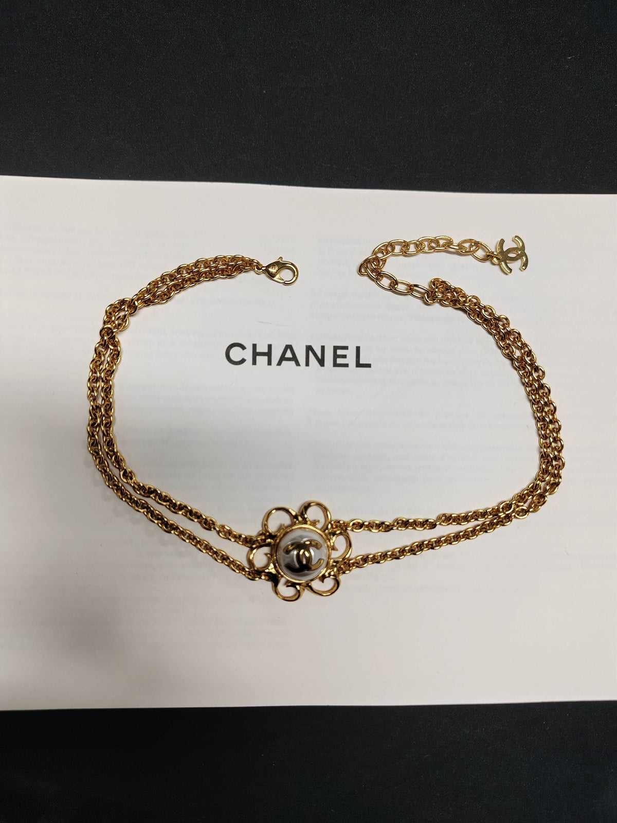 Chanel - Other - Gold-tone metal with a faux pearl detail; exact alloy unspecified - Gold