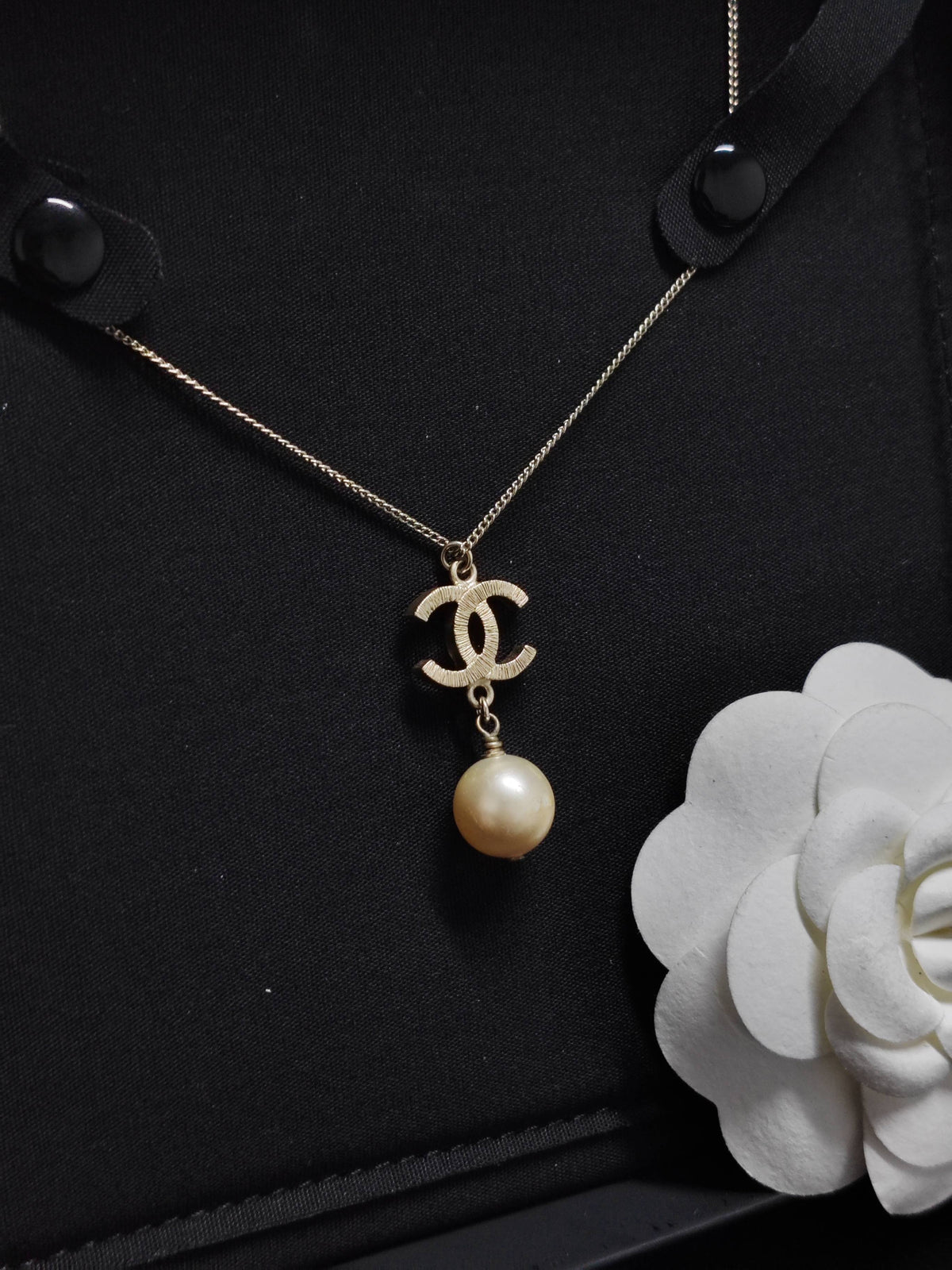 Chanel - Other - Gold-tone metal with a faux pearl pendant; exact pearl composition is unknown. - Gold
