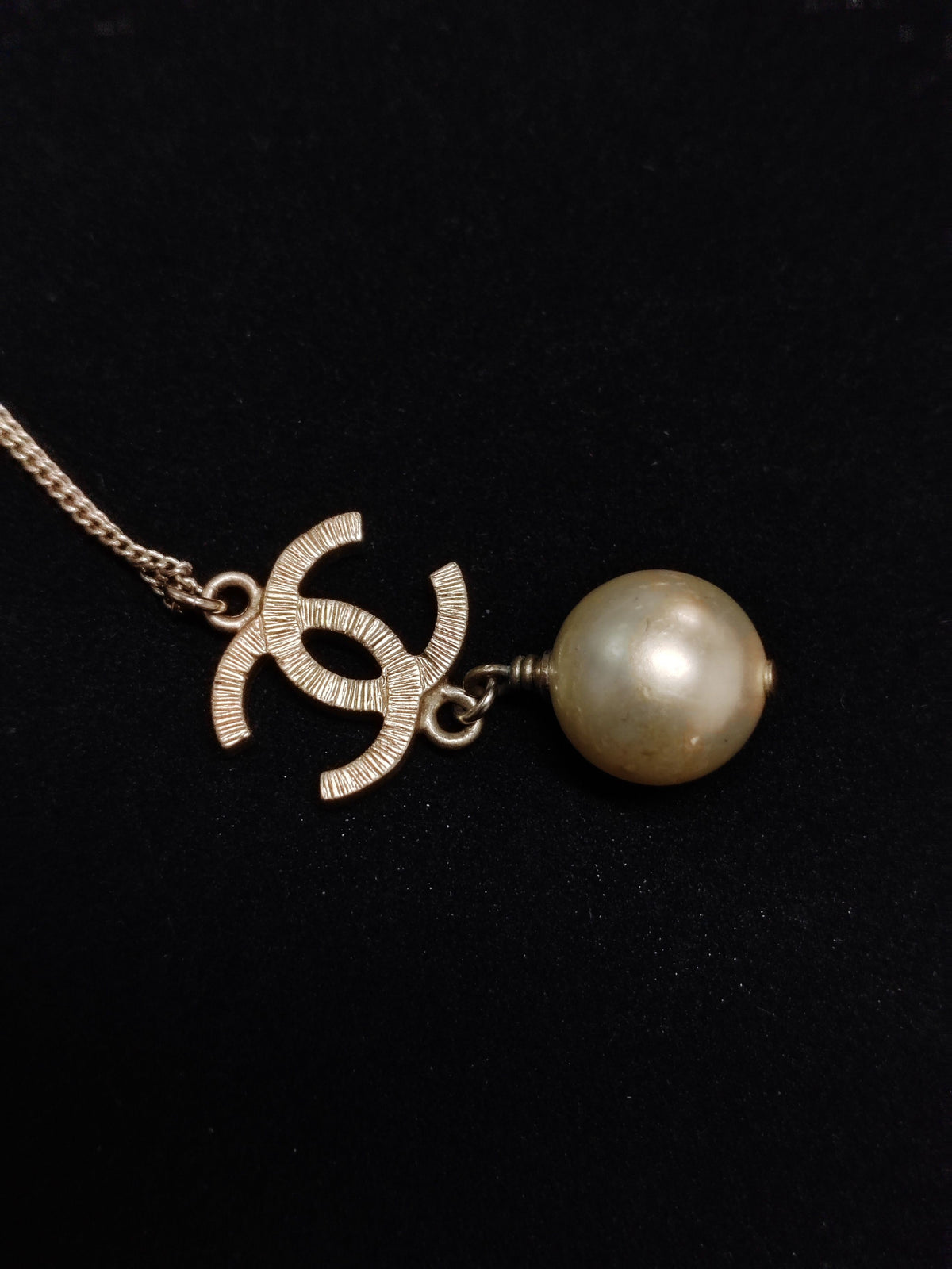 Chanel - Other - Gold-tone metal with a faux pearl pendant; exact pearl composition is unknown. - Gold