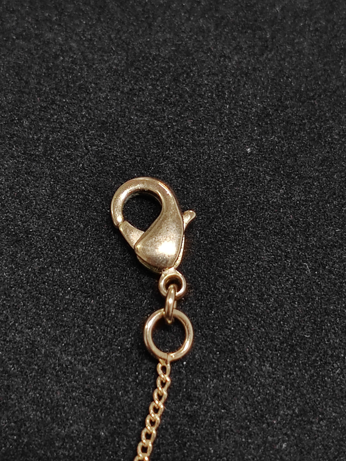 Chanel - Other - Gold-tone metal with a faux pearl pendant; exact pearl composition is unknown. - Gold