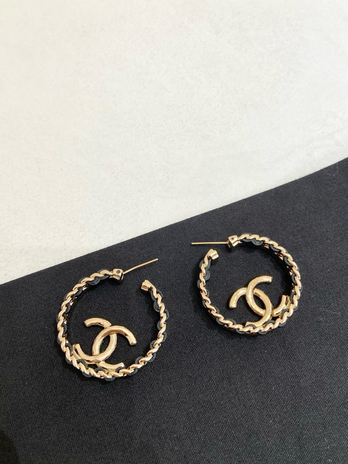 Chanel - Other - Gold-tone metal with a leather-interwoven chain detail. - Gold
