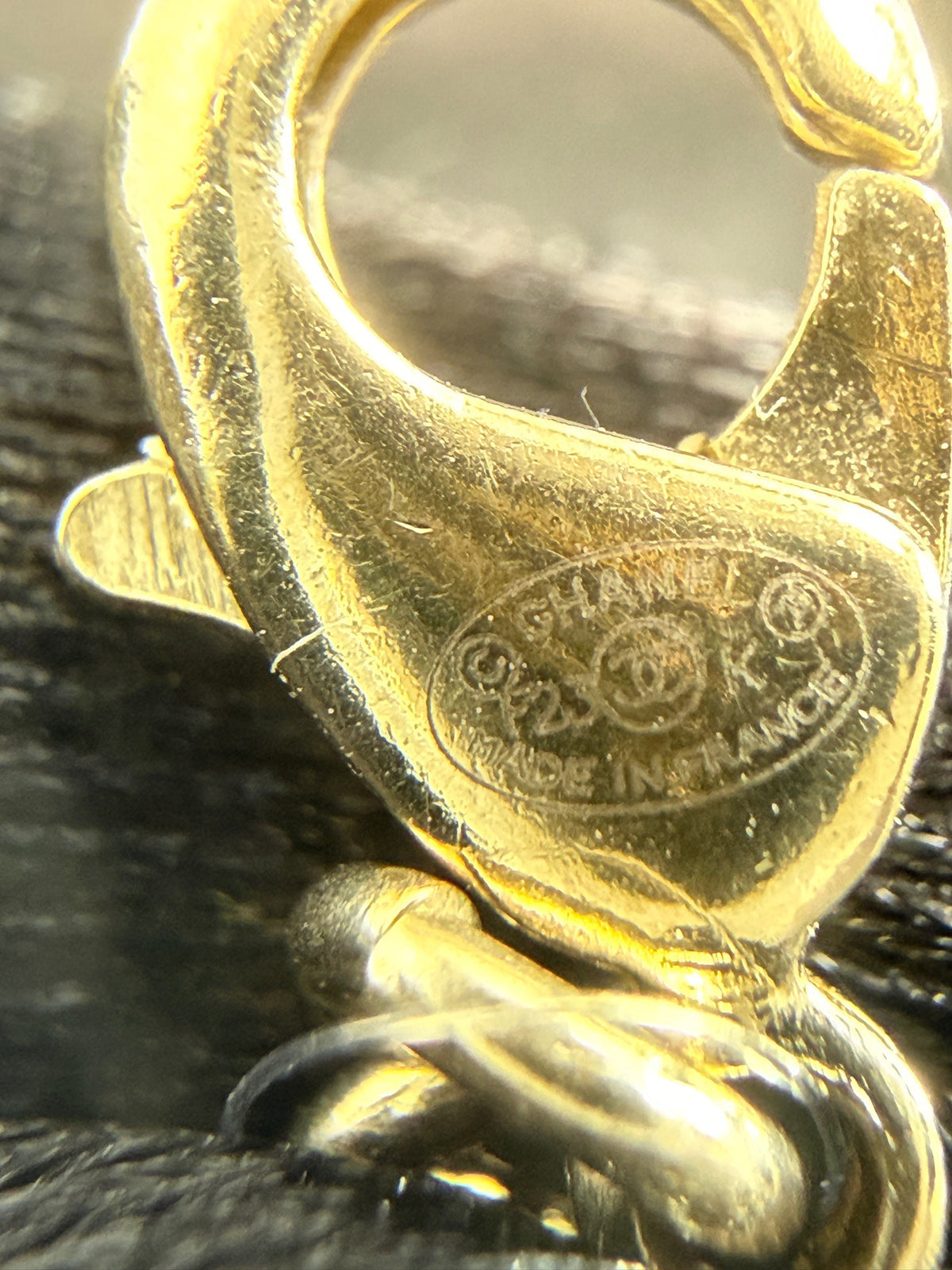 Chanel - Other - Gold-tone metal with a pearl-style pendant and clear decorative stones. - Gold