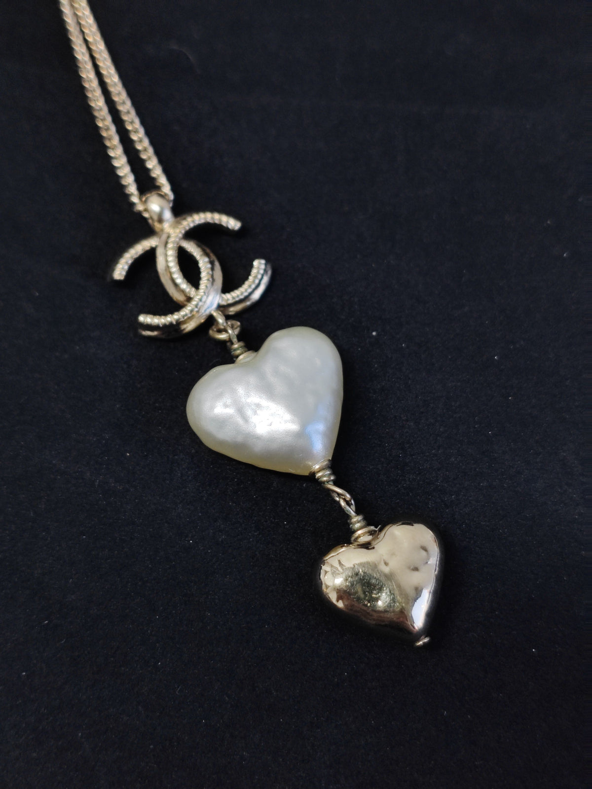 Chanel - Other - Gold-tone metal with a white heart-shaped faux-pearl pendant and a gold-tone heart charm. - Multicolour