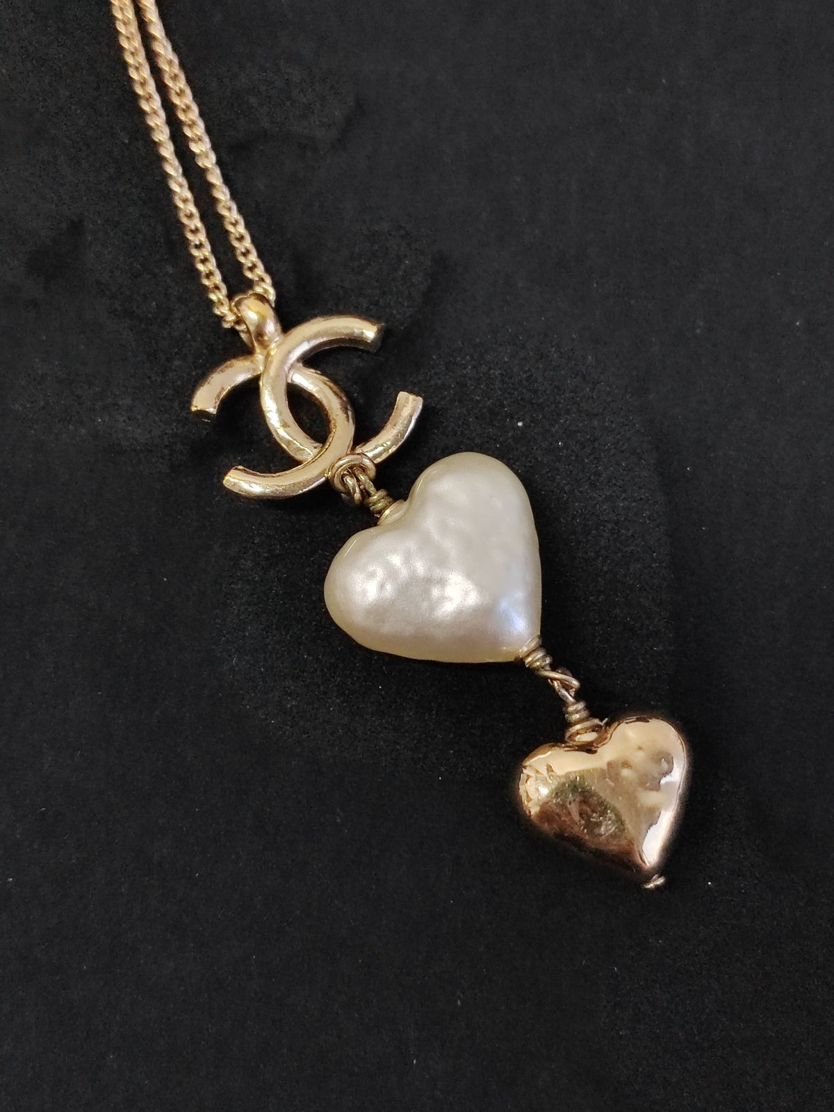 Chanel - Other - Gold-tone metal with a white heart-shaped faux-pearl pendant and a gold-tone heart charm. - Multicolour