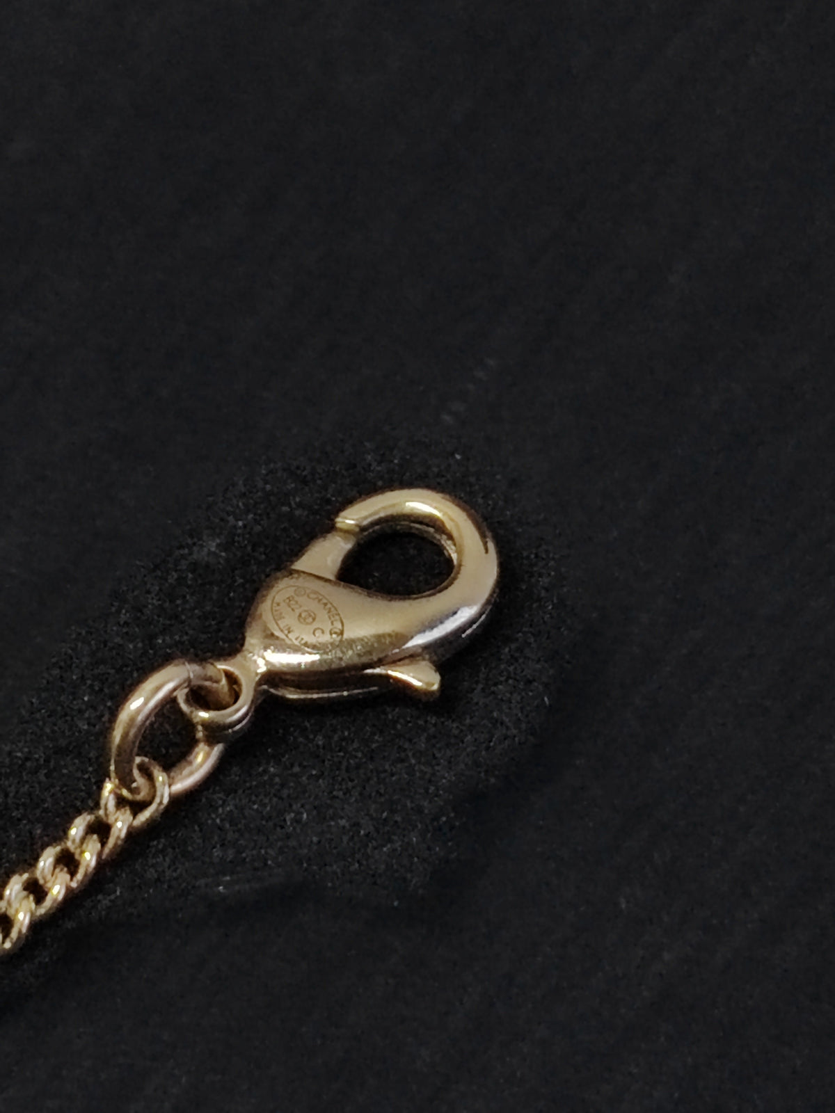 Chanel - Other - Gold-tone metal with a white heart-shaped faux-pearl pendant and a gold-tone heart charm. - Multicolour