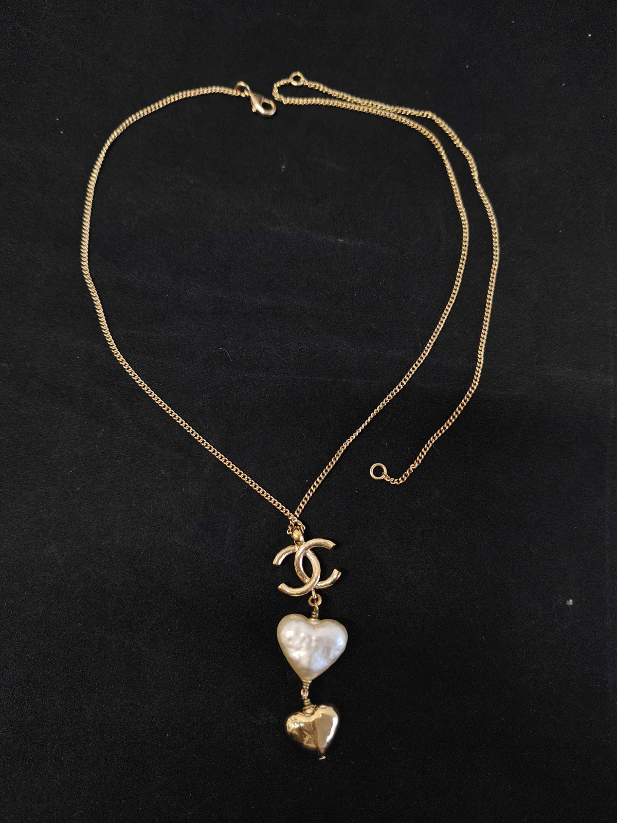 Chanel - Other - Gold-tone metal with a white heart-shaped faux-pearl pendant and a gold-tone heart charm. - Multicolour