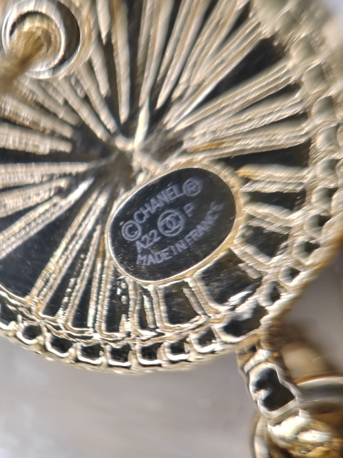 Chanel - Other - Gold-tone metal with black and beige decorative inlays. - Multicolour