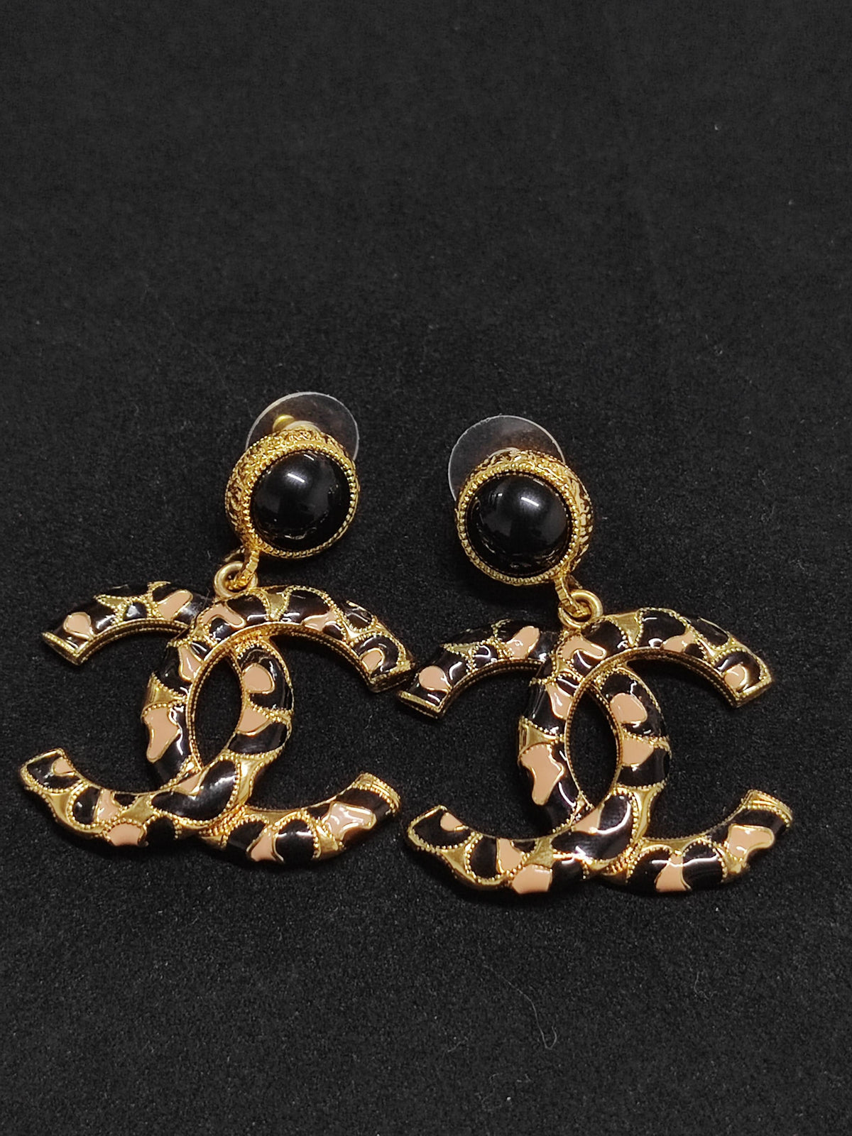 Chanel - Other - Gold-tone metal with black and beige decorative inlays. - Multicolour