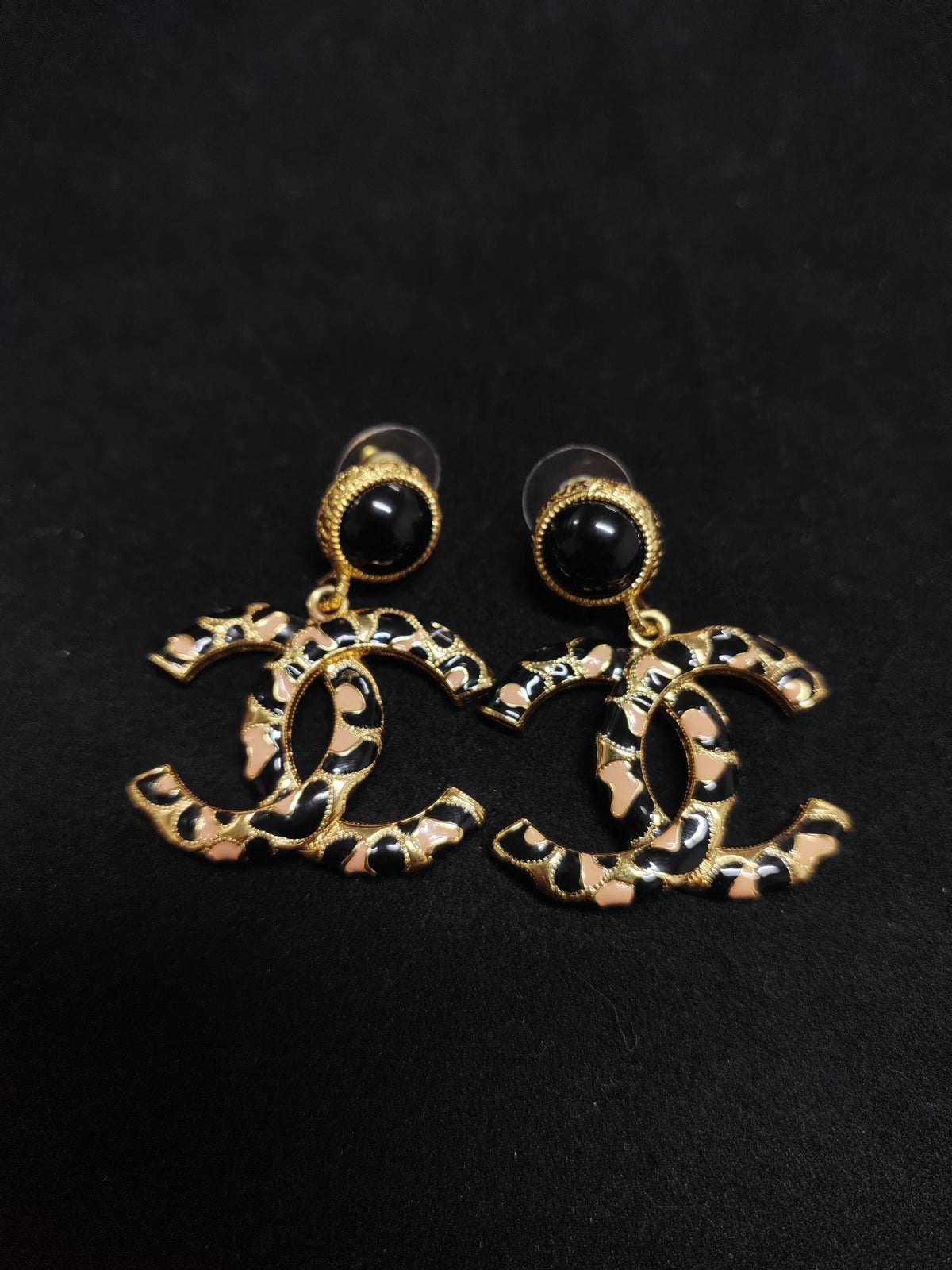 Chanel - Other - Gold-tone metal with black and beige decorative inlays. - Multicolour