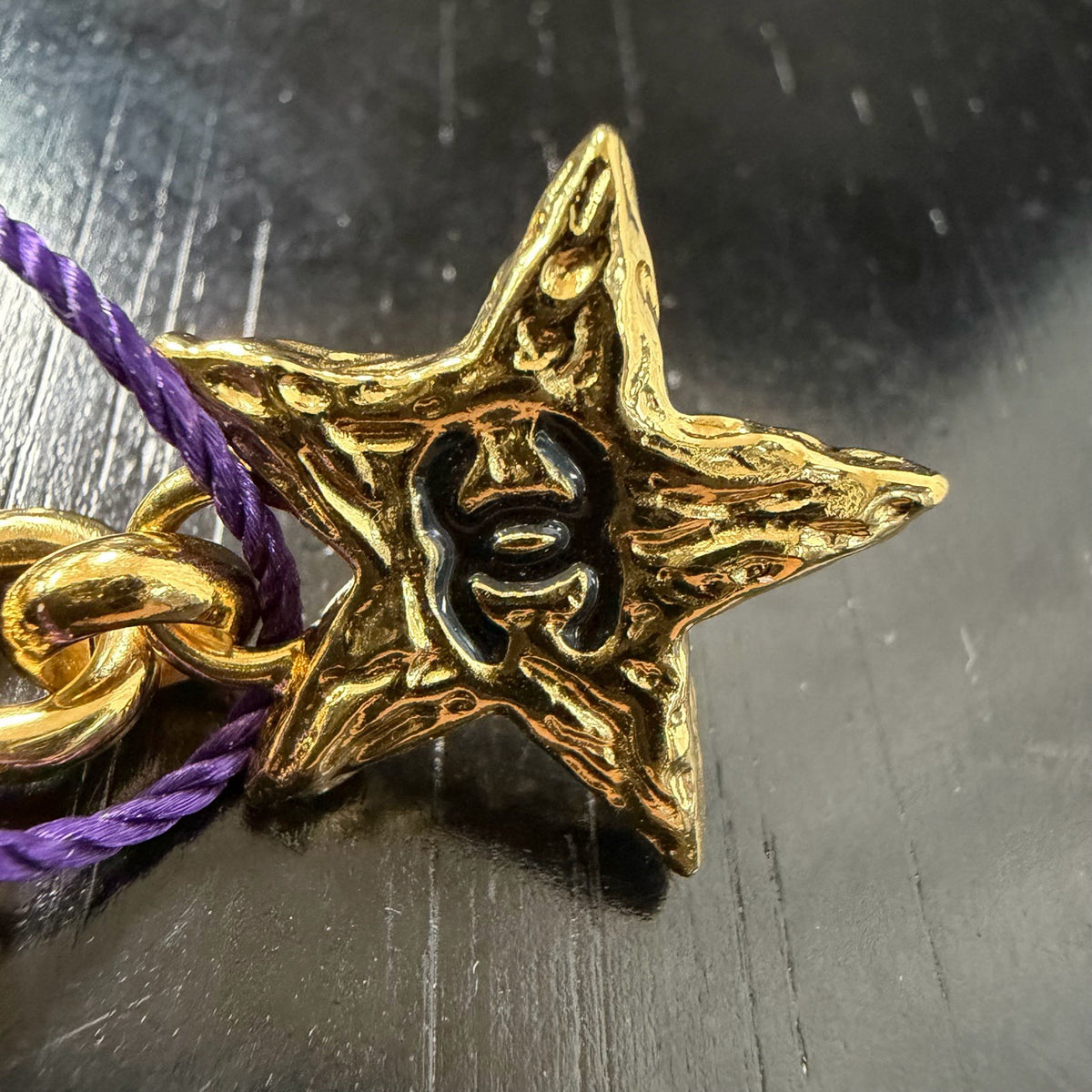 Chanel - Other - Gold-tone metal with black enamel accents. - Gold