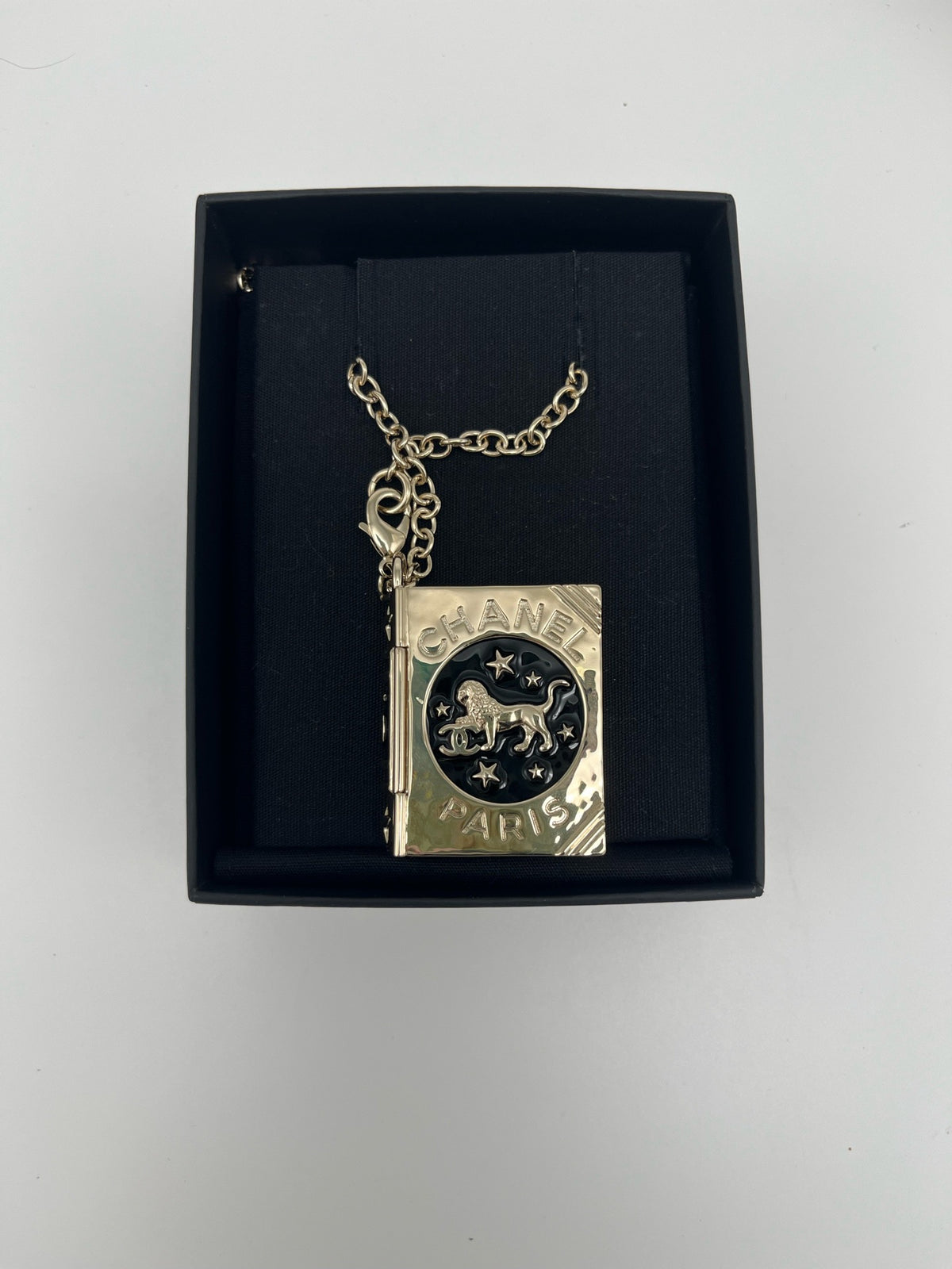 Chanel - Other - Gold-tone metal with black enamel accents. - Gold - (One size)