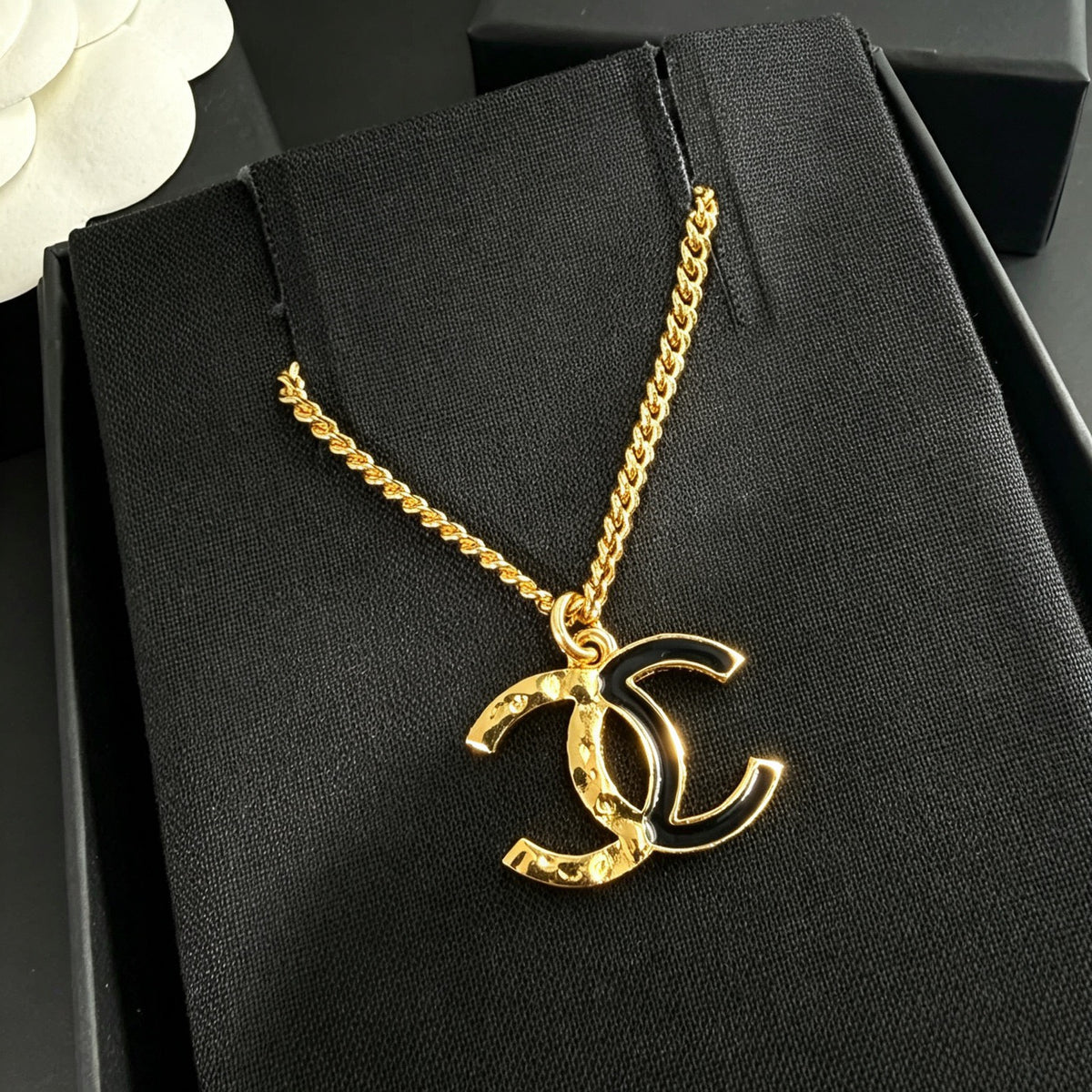 Chanel - Other - Gold-tone metal with black enamel. - Multicolour
