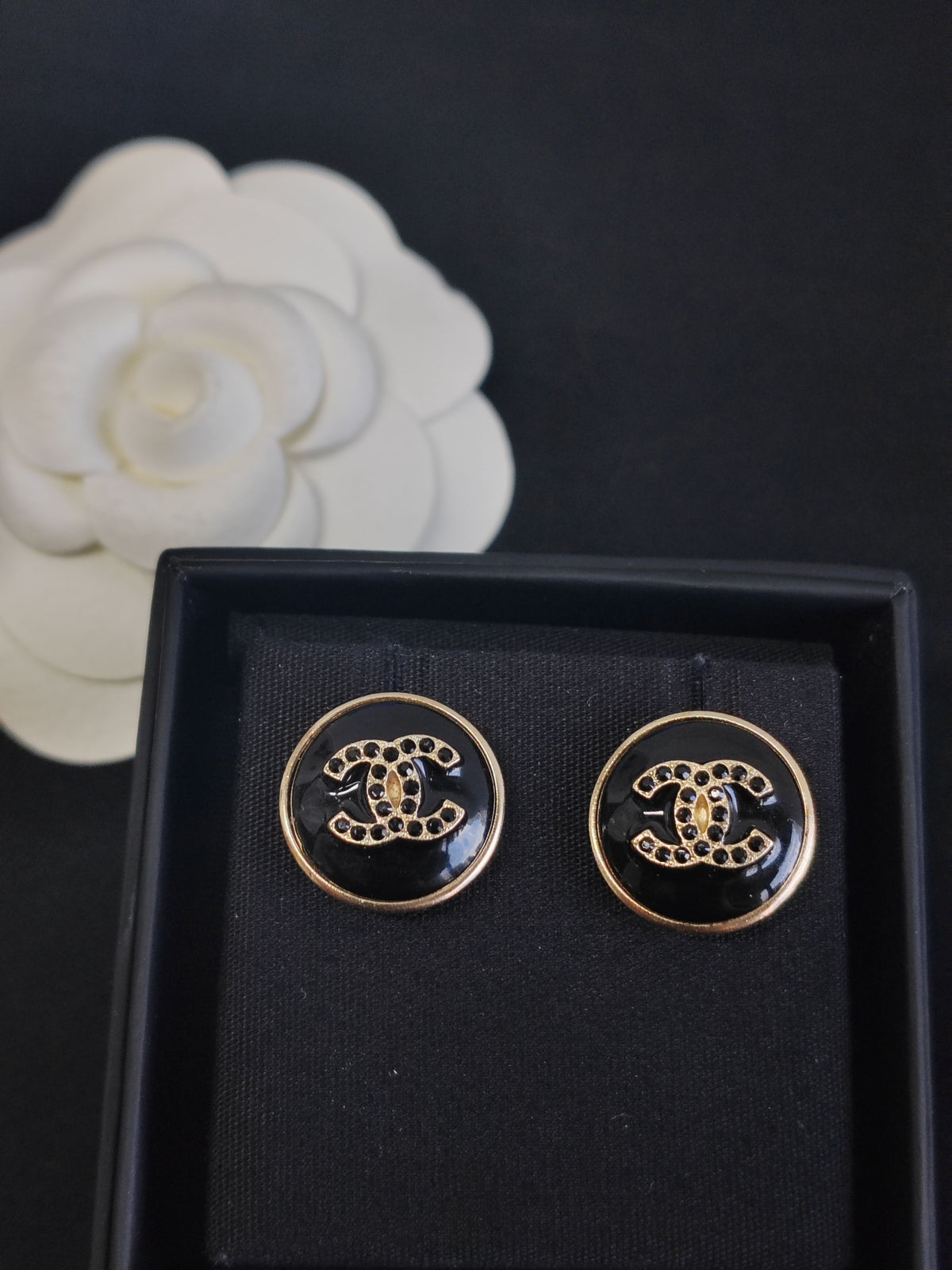 Chanel - Other - Gold-tone metal with black enamel or resin and dark glass crystal accents. - Black