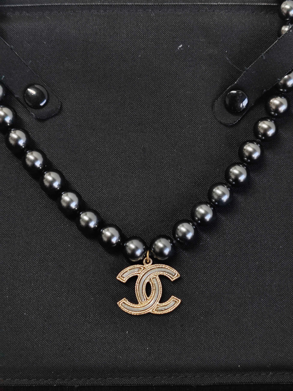 Chanel - Other - Gold-tone metal with black faux-pearl beads. - Black