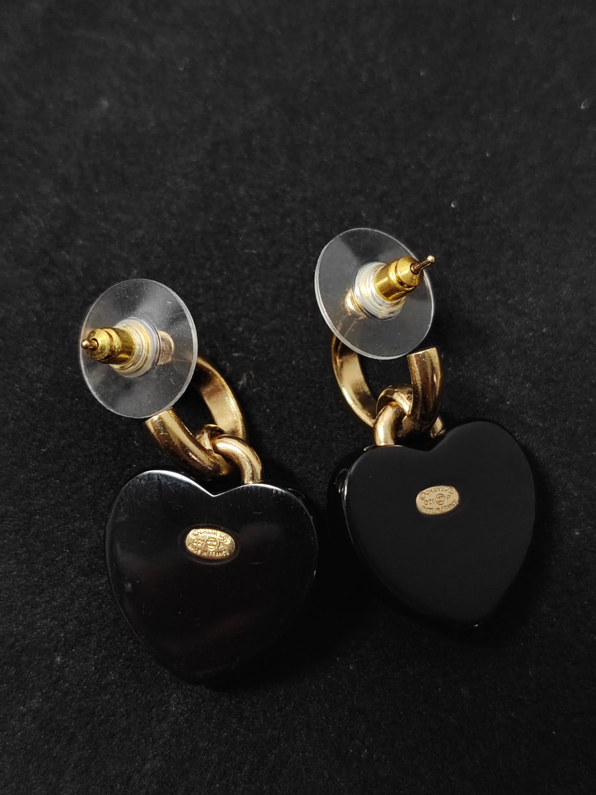Chanel - Other - Gold-tone metal with black heart-shaped resin elements and crystal embellishment; composition not confirmed. - Black