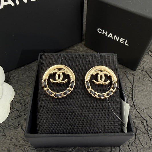 Chanel - Other - Gold-tone metal with black leather accents; exact metal composition is unspecified. - Multicolour