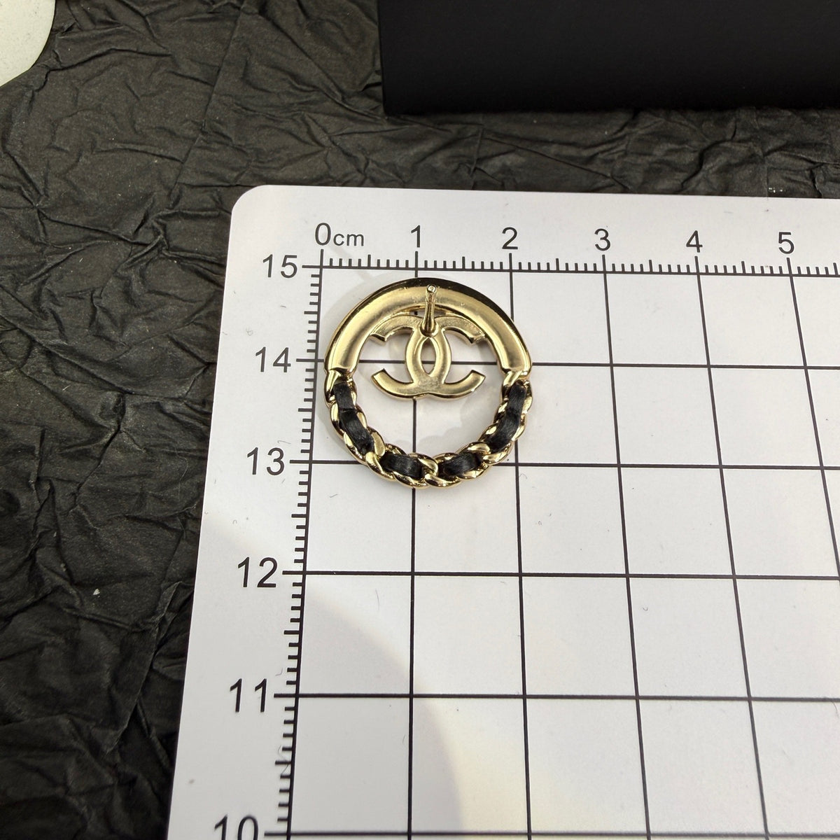 Chanel - Other - Gold-tone metal with black leather accents; exact metal composition is unspecified. - Multicolour
