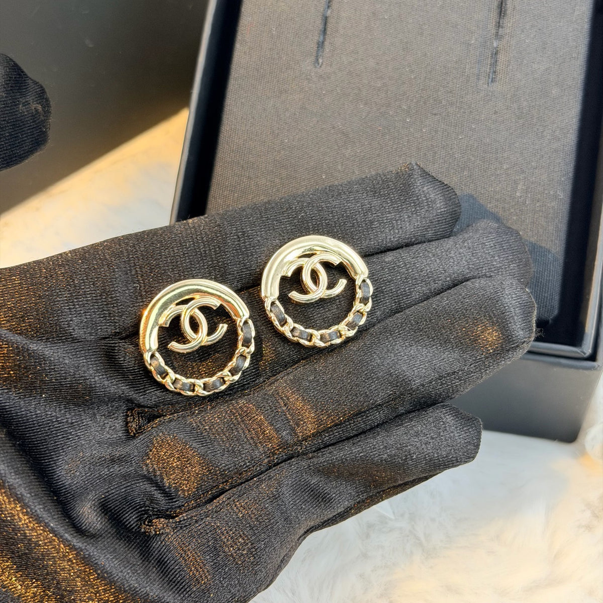 Chanel - Other - Gold-tone metal with black leather accents; exact metal composition is unspecified. - Multicolour