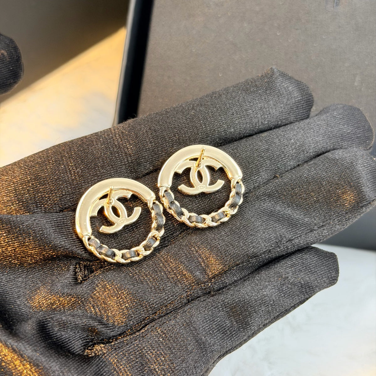 Chanel - Other - Gold-tone metal with black leather accents; exact metal composition is unspecified. - Multicolour