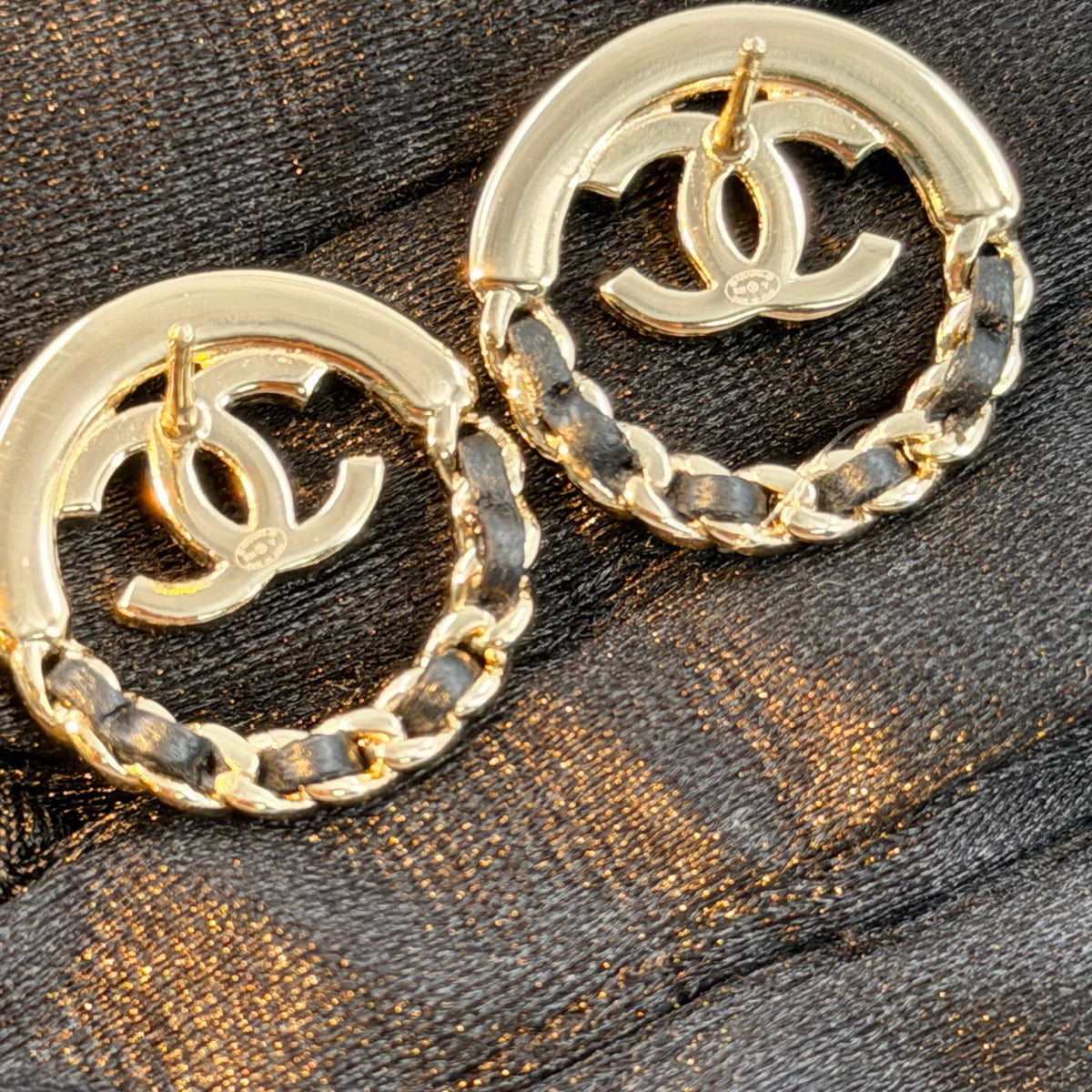 Chanel - Other - Gold-tone metal with black leather accents; exact metal composition is unspecified. - Multicolour