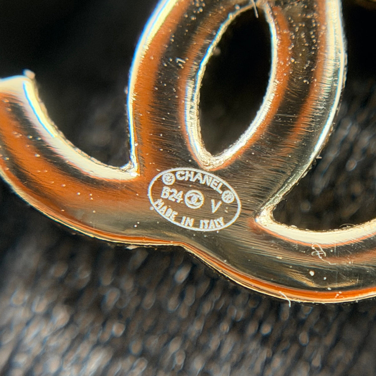 Chanel - Other - Gold-tone metal with black leather accents; exact metal composition is unspecified. - Multicolour