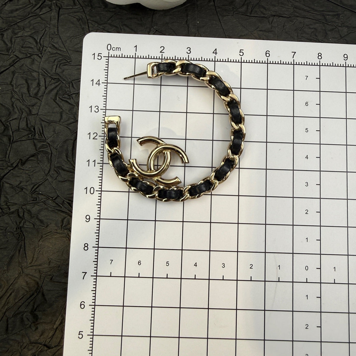 Chanel - Other - Gold-tone metal with black leather accents. - Multicolour