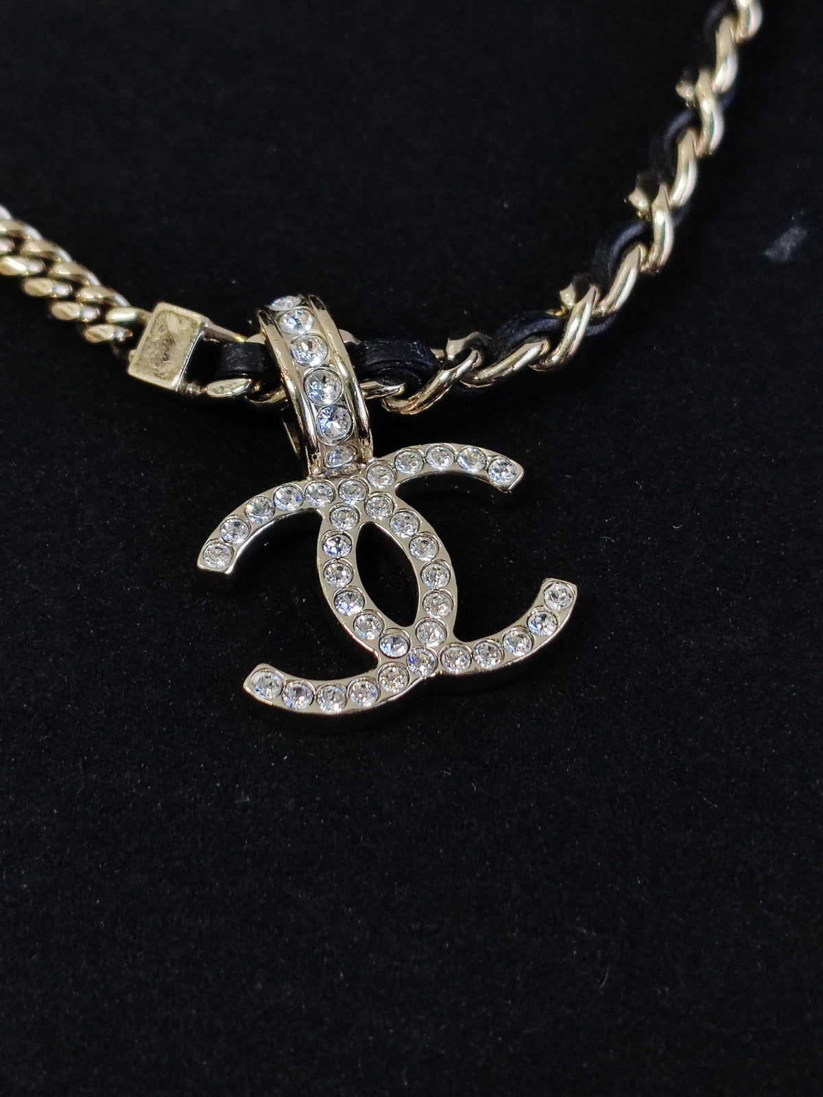 Chanel - Other - Gold-tone metal with black leather and clear rhinestone embellishment. - Multicolour