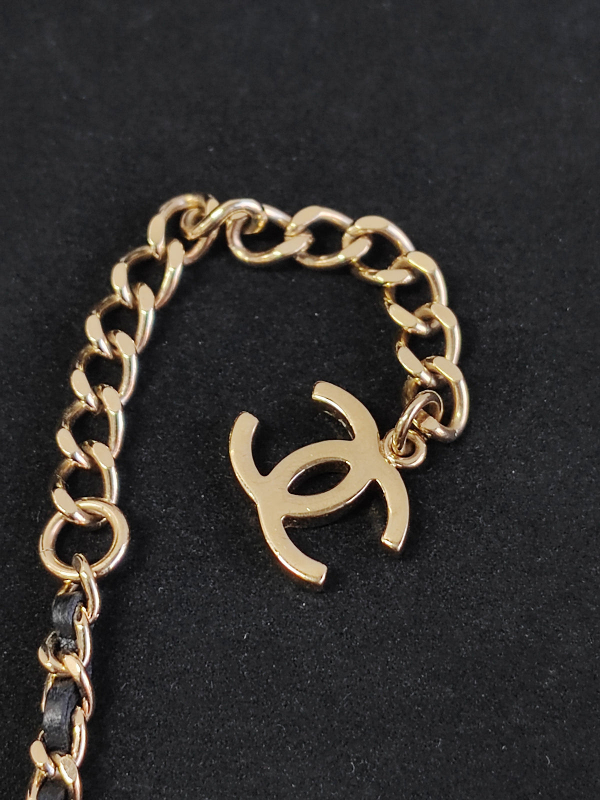 Chanel - Other - Gold-tone metal with black leather and clear rhinestone embellishment. - Multicolour