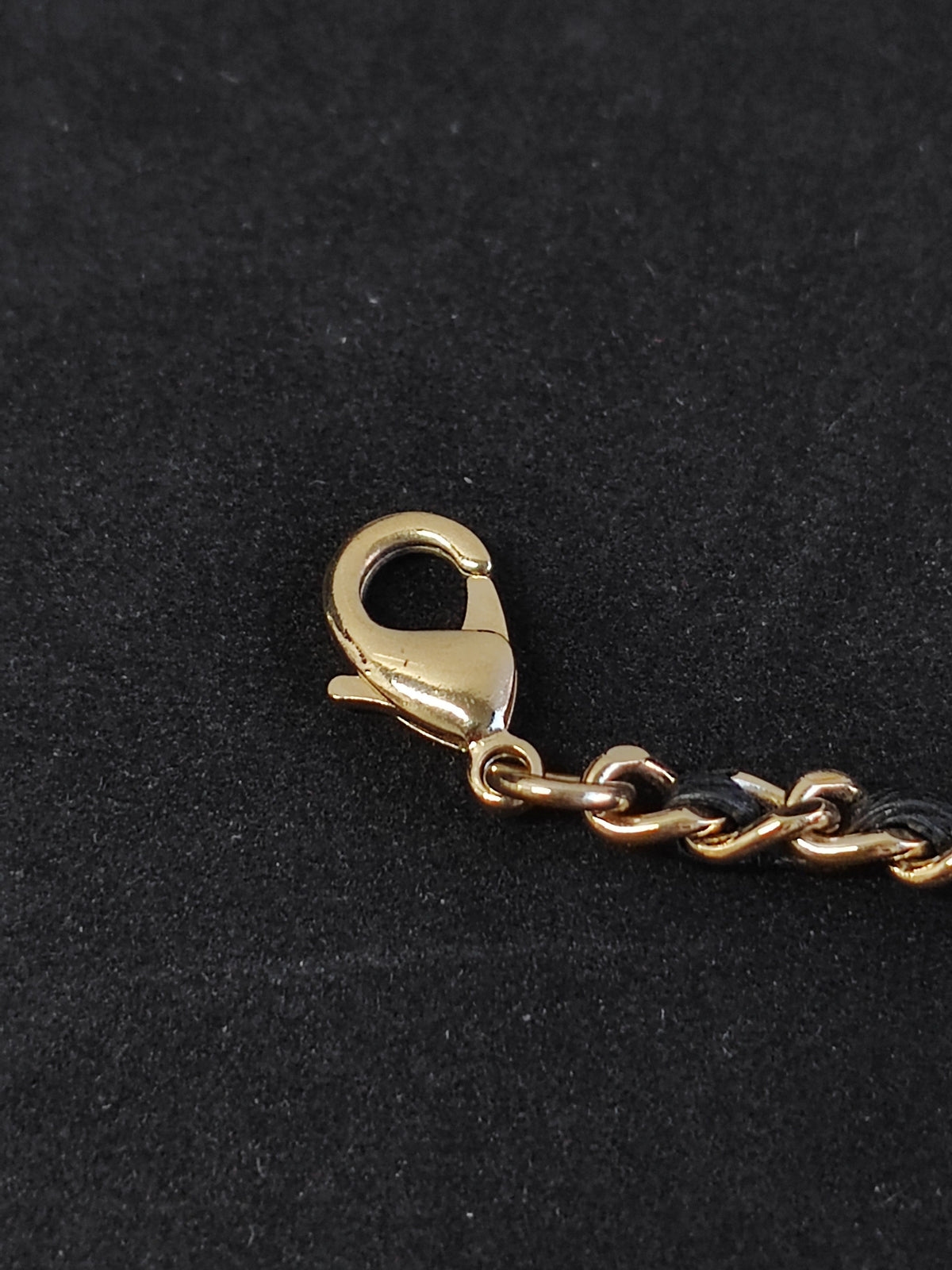 Chanel - Other - Gold-tone metal with black leather and clear rhinestone embellishment. - Multicolour