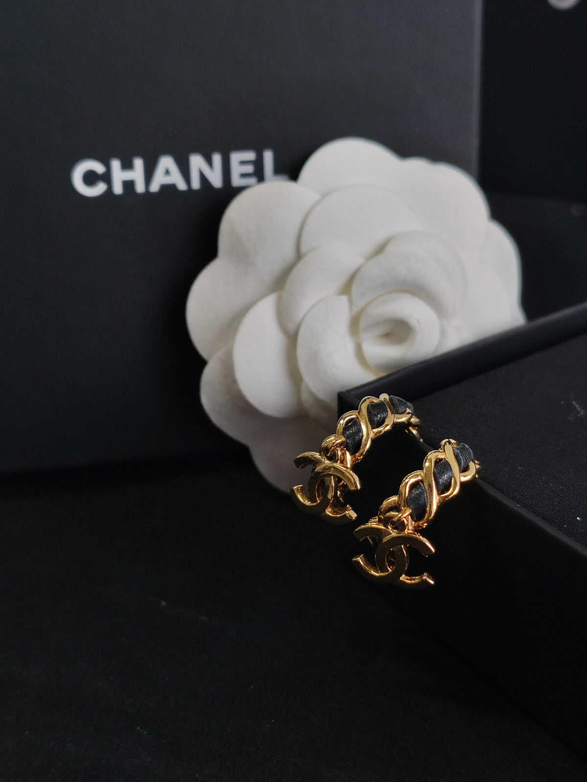 Chanel - Other - Gold-tone metal with black woven leather accents. - Multicolour
