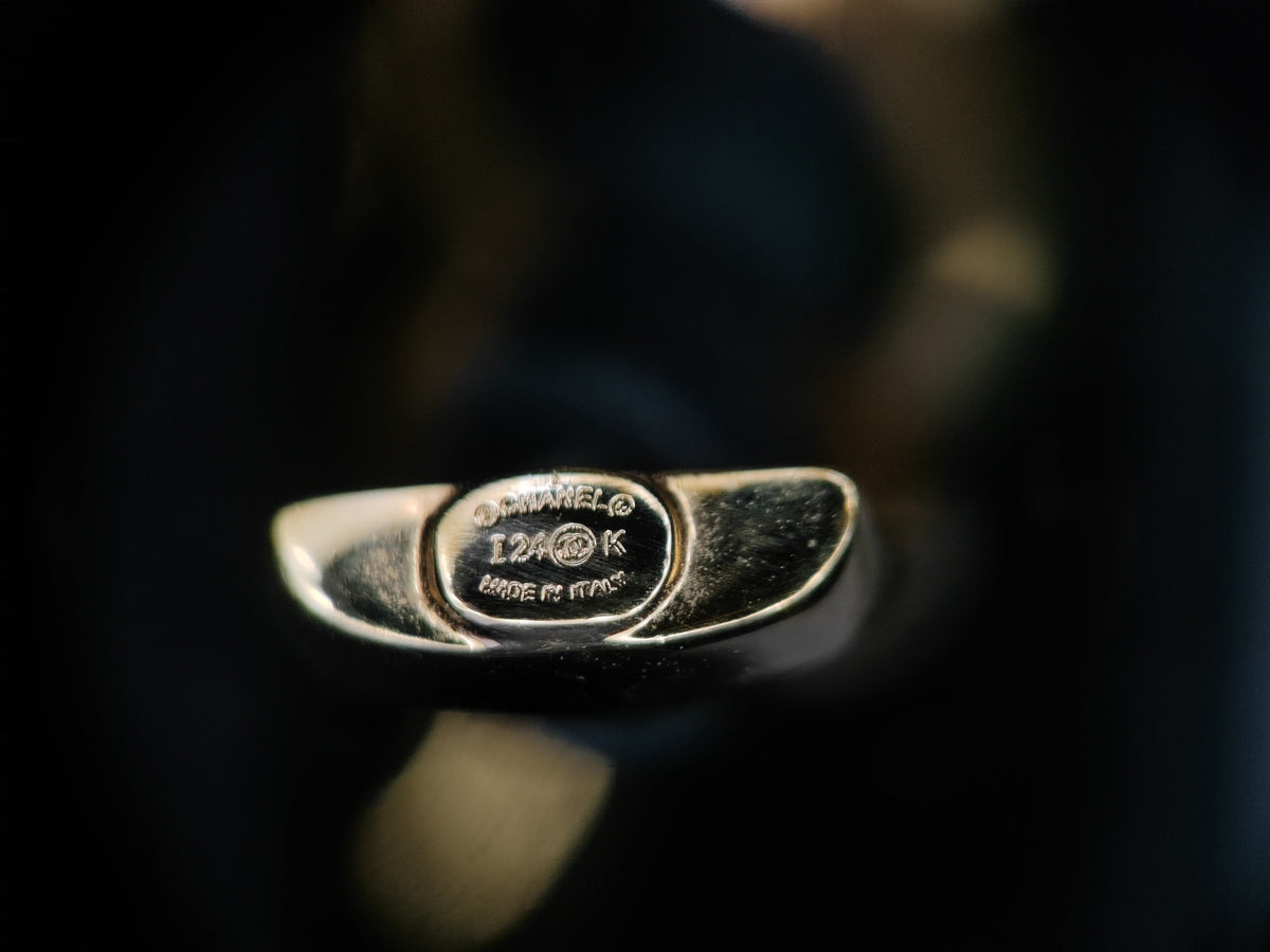Chanel - Other - Gold-tone metal with black woven leather accents. - Multicolour