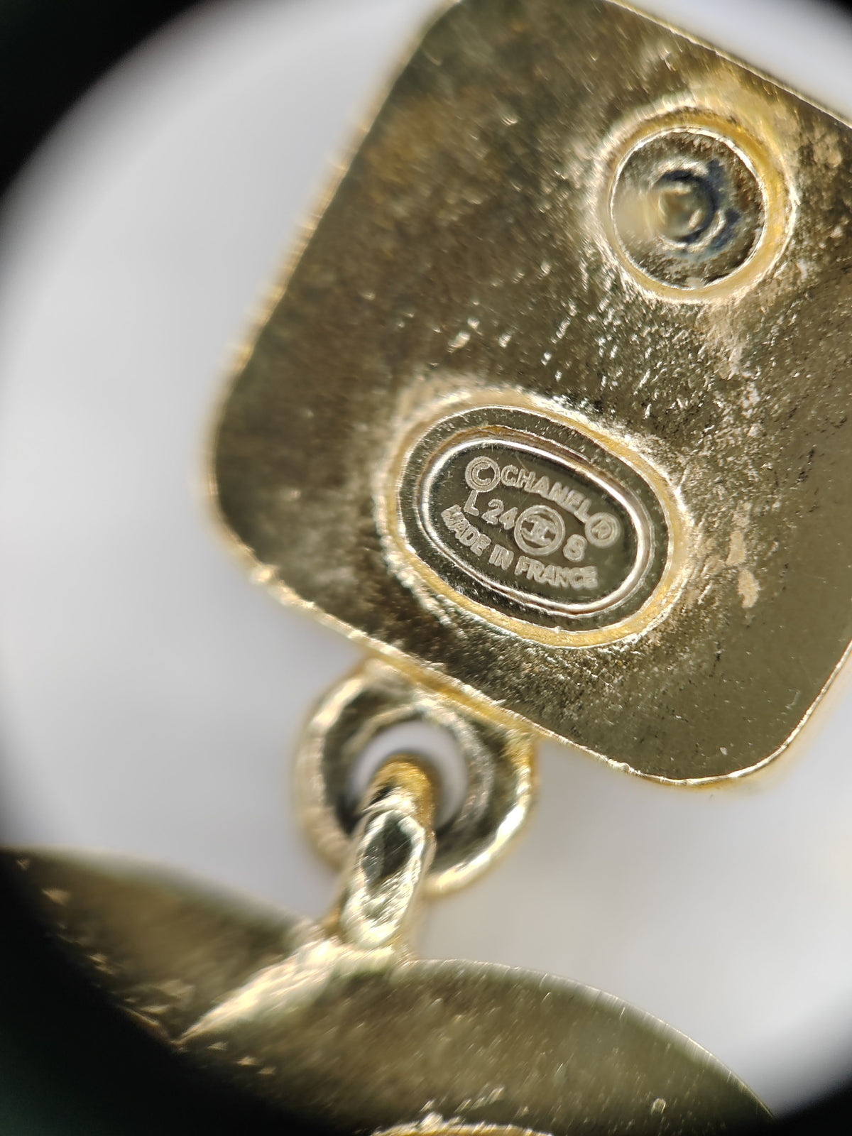 Chanel - Other - Gold-tone metal with brown and clear crystal embellishments. - Multicolour
