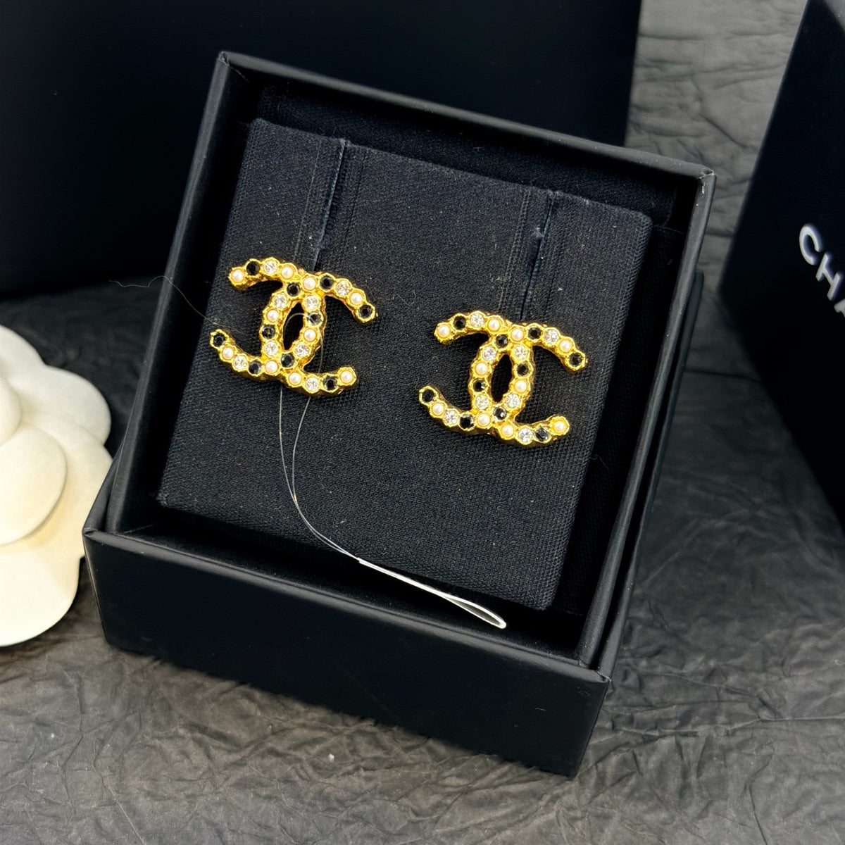Chanel - Other - Gold-tone metal with clear and black crystal-like embellishments - Gold