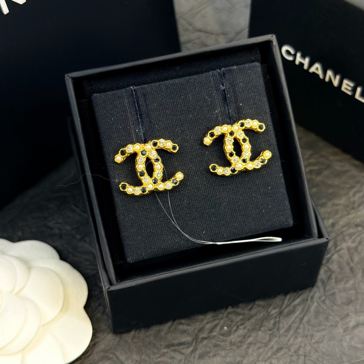 Chanel - Other - Gold-tone metal with clear and black crystal-like embellishments - Gold
