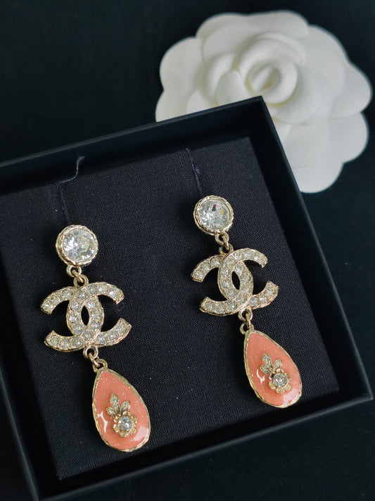 Chanel - Other - Gold-tone metal with clear crystal embellishments and pink enamel details. - Multicolour