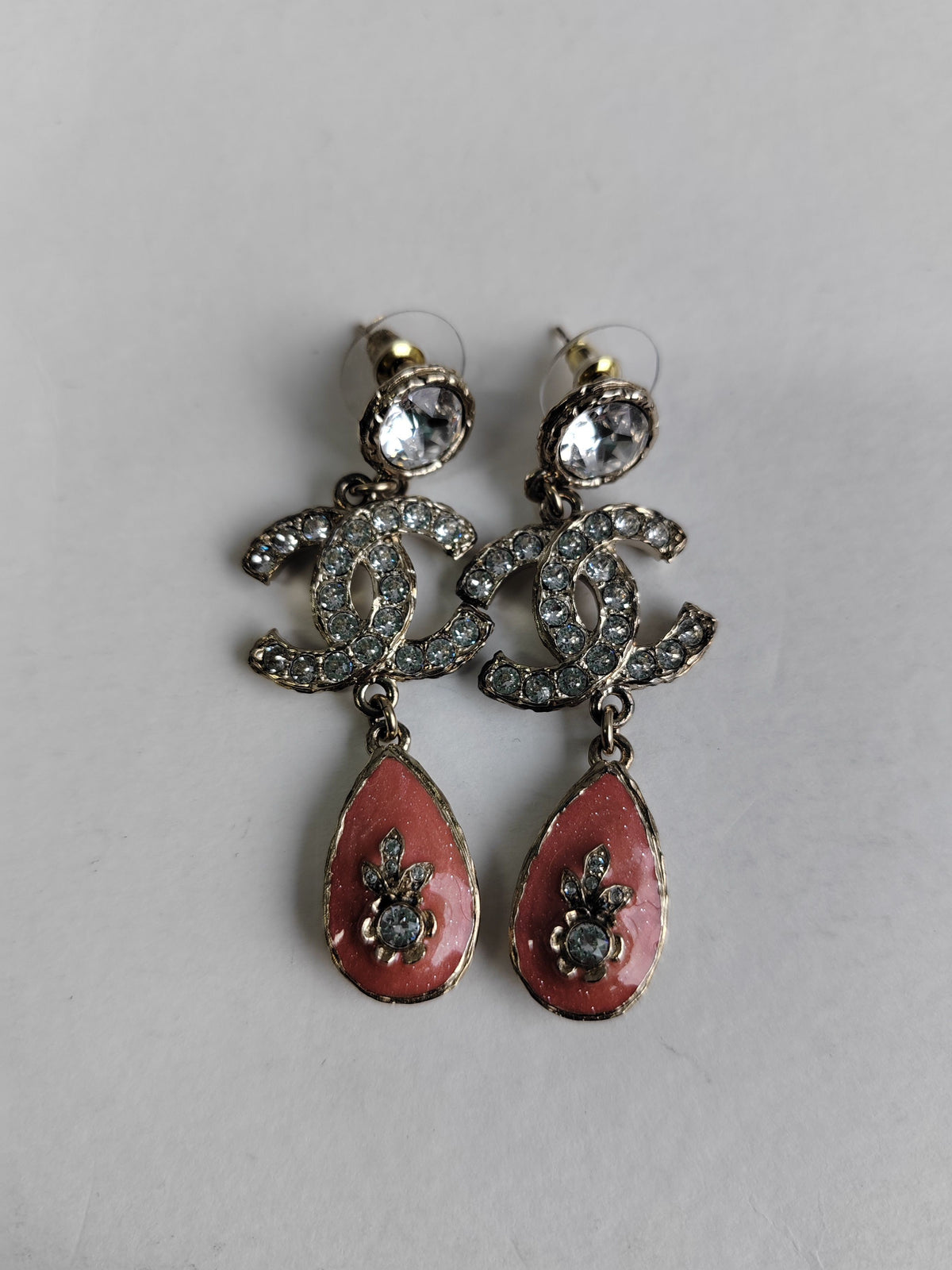 Chanel - Other - Gold-tone metal with clear crystal embellishments and pink enamel details. - Multicolour