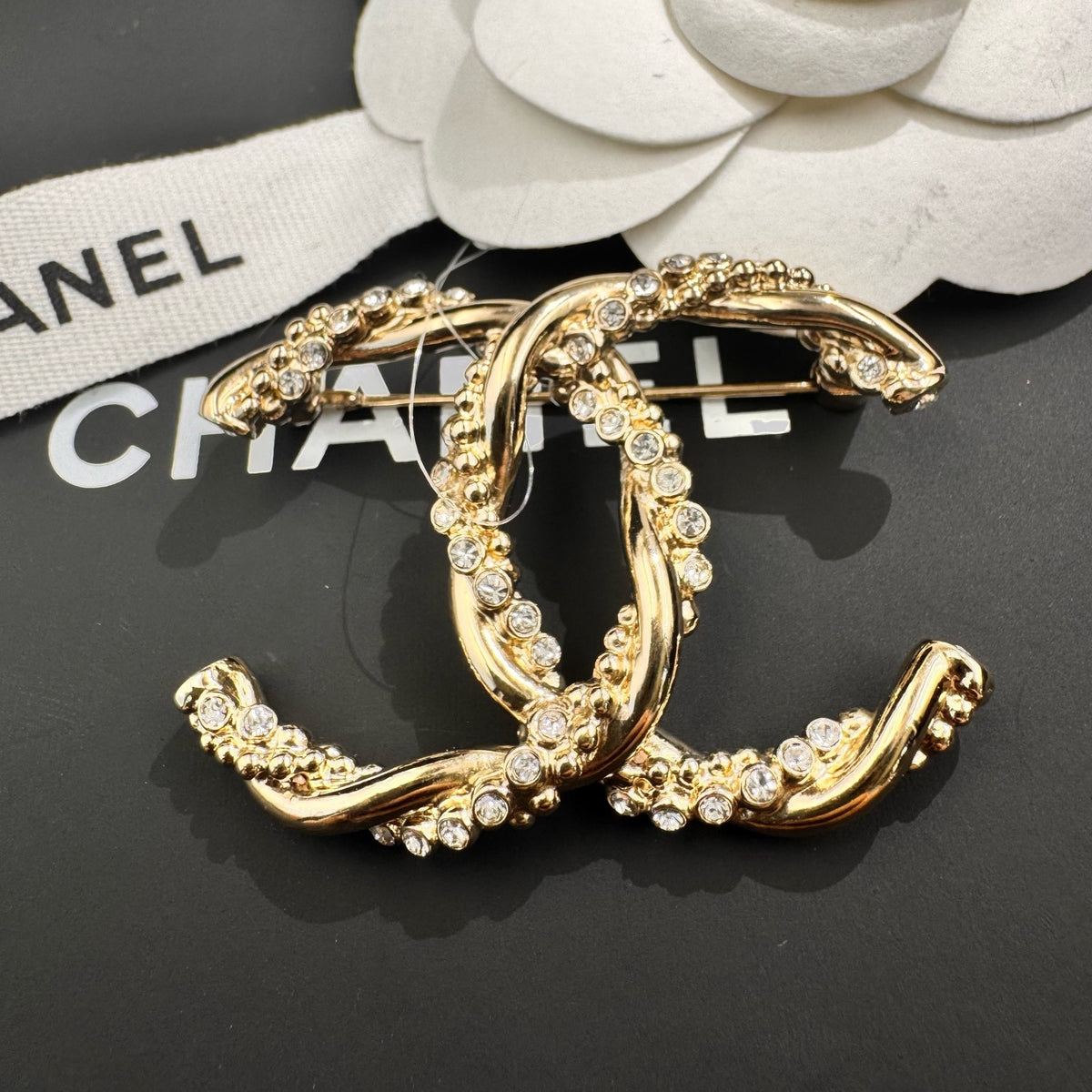 Chanel - Other - Gold-tone metal with clear crystal embellishments - Gold