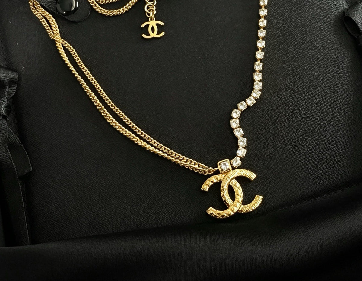 Chanel - Other - Gold-tone metal with clear crystal embellishments. - Gold