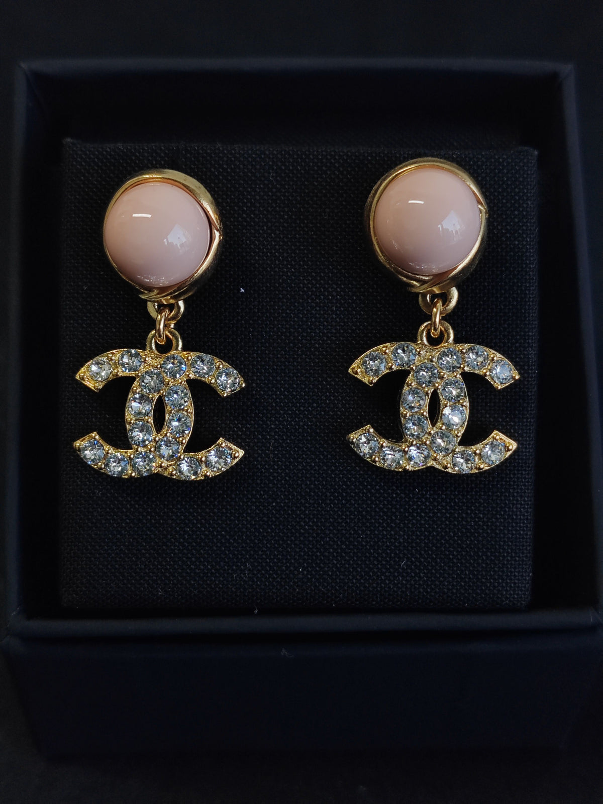 Chanel - Other - Gold-tone metal with clear crystals and pink cabochons; exact composition unknown. - Pink