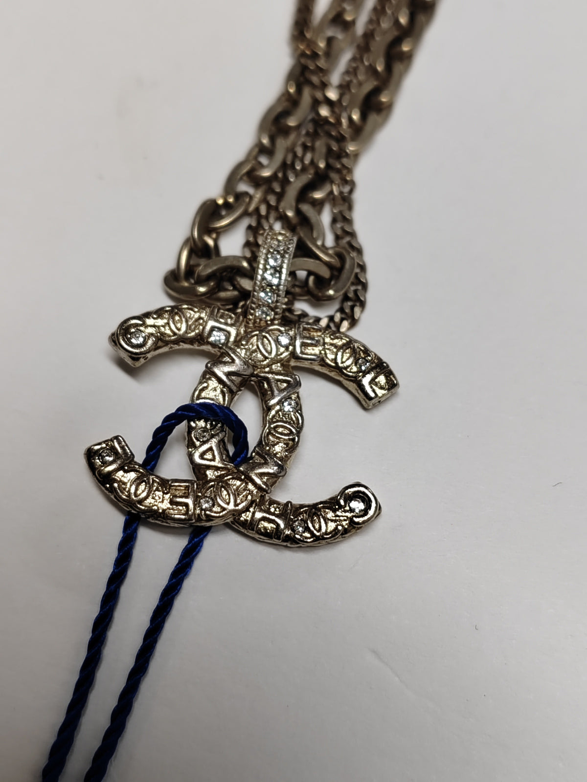 Chanel - Other - Gold-tone metal with clear decorative stones. - Gold