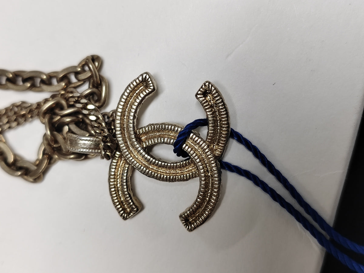 Chanel - Other - Gold-tone metal with clear decorative stones. - Gold