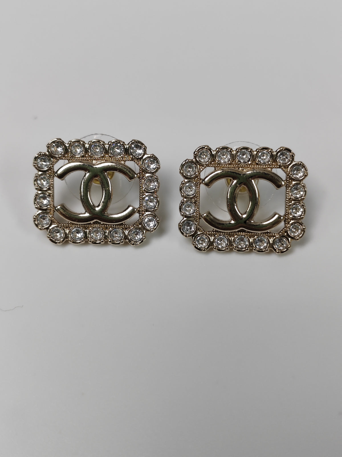 Chanel - Other - Gold-tone metal with clear glass rhinestone embellishments; exact alloy unspecified. - Gold