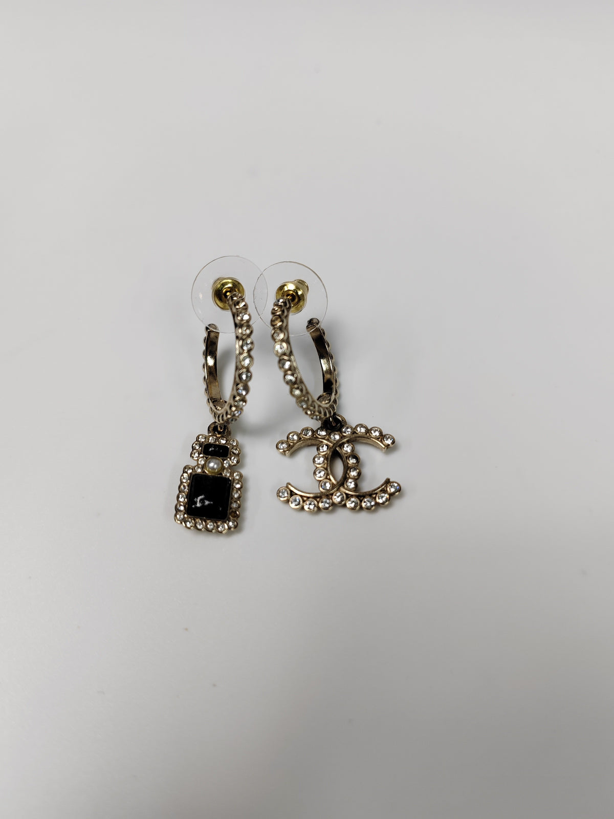 Chanel - Other - Gold-tone metal with clear glass rhinestones, black accents and a faux pearl accent. - Gold