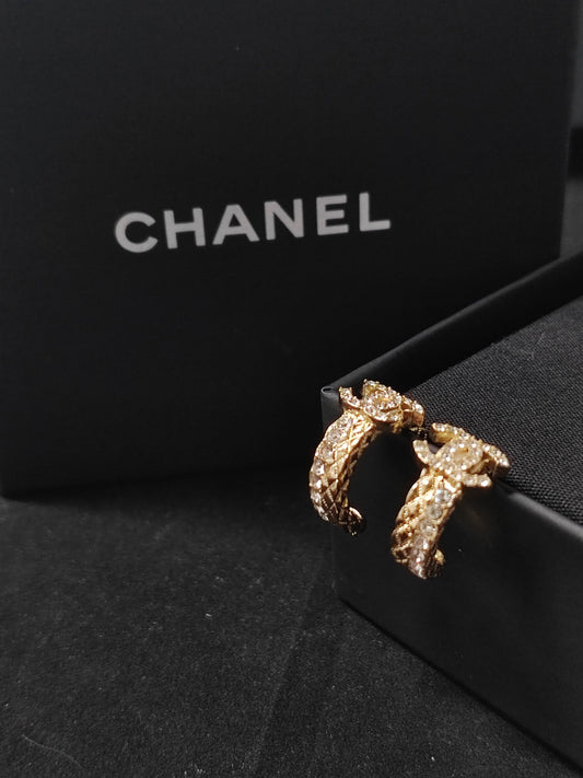 Chanel - Other - Gold-tone metal with clear glass rhinestones. - Gold