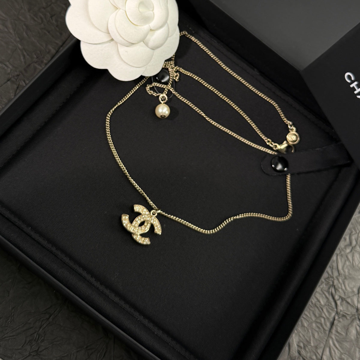 Chanel - Other - Gold-tone metal with clear rhinestone accents and a pearl-like drop - Gold - (43+15)