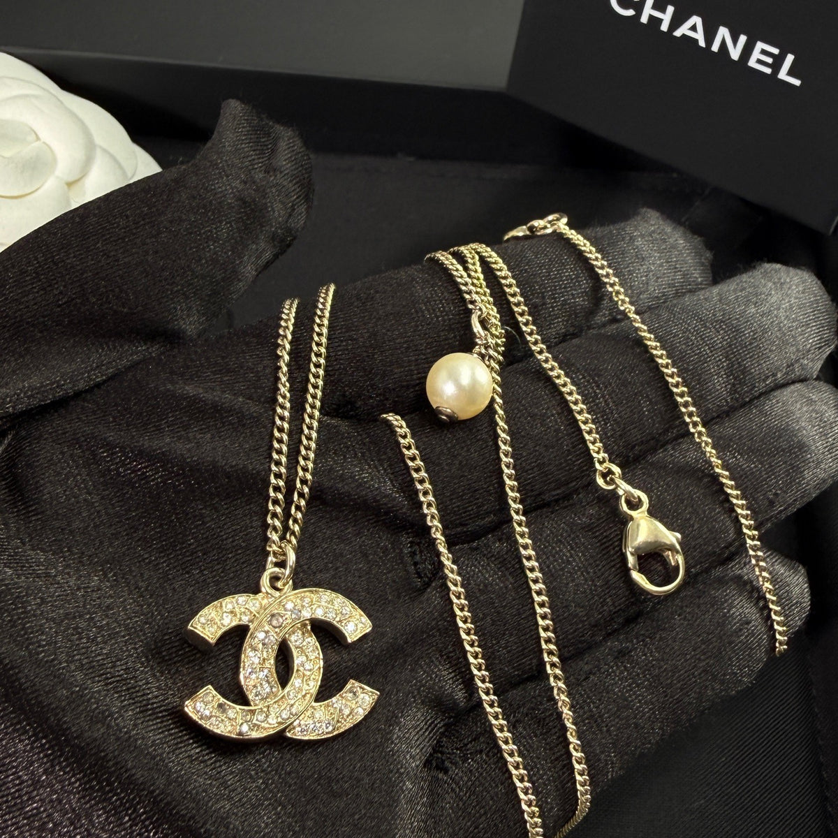 Chanel - Other - Gold-tone metal with clear rhinestone accents and a pearl-like drop - Gold - (43+15)
