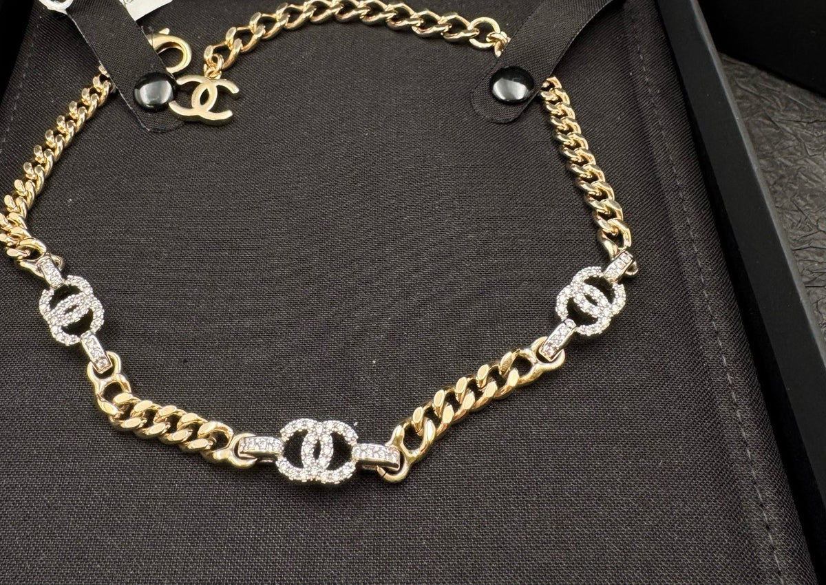 Chanel - Other - Gold-tone metal with clear rhinestone accents - Multicolour - (30+7 cm)