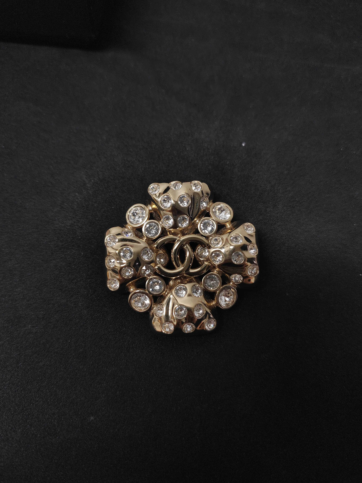 Chanel - Other - Gold-tone metal with clear rhinestone embellishments; exact base-metal composition is not confirmed. - Gold