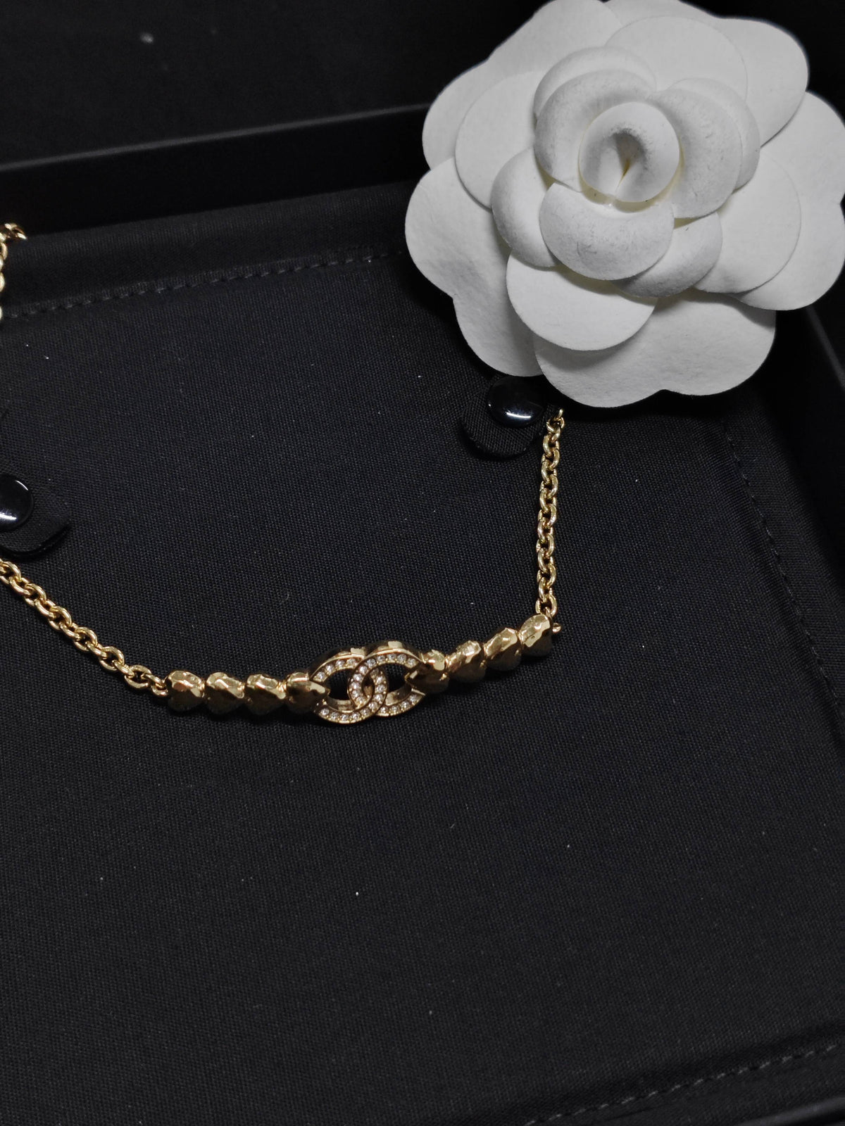 Chanel - Other - Gold-tone metal with clear rhinestone embellishments. - Gold