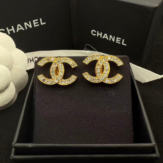 Chanel - Other - Gold-tone metal with clear rhinestone embellishments - Gold